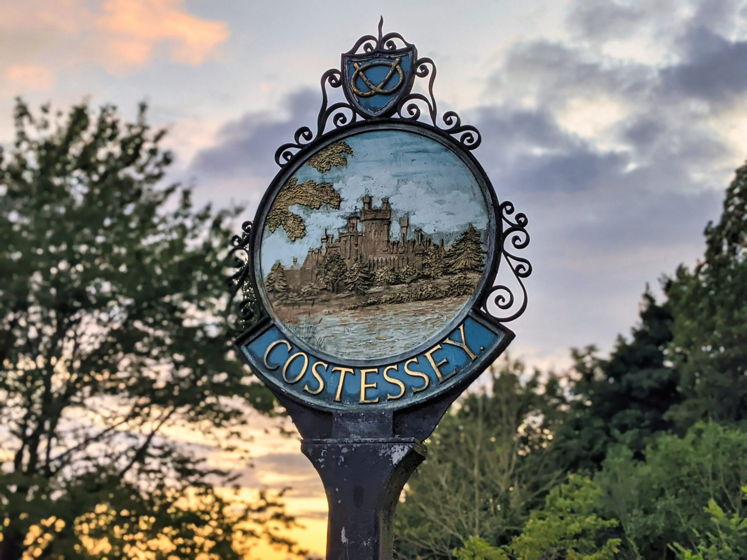 The Costessey village sign at sunset
